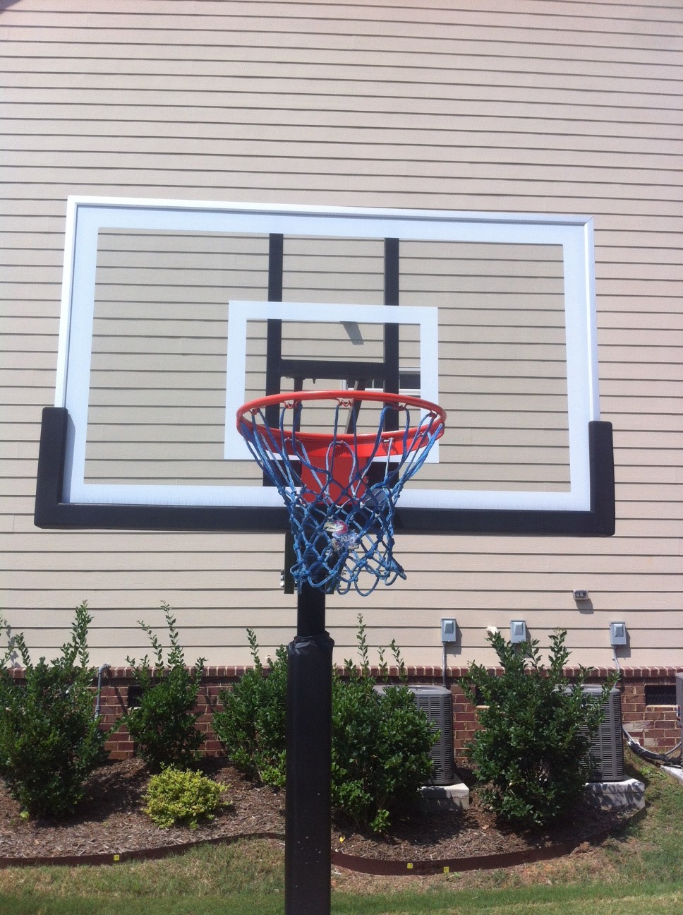 THe Pro Dunk Gold basketball hoop with KU net. Rock Chalk Jayhawk!